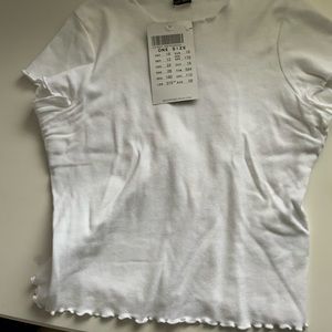 White ruffled brandy mellevile t shirt